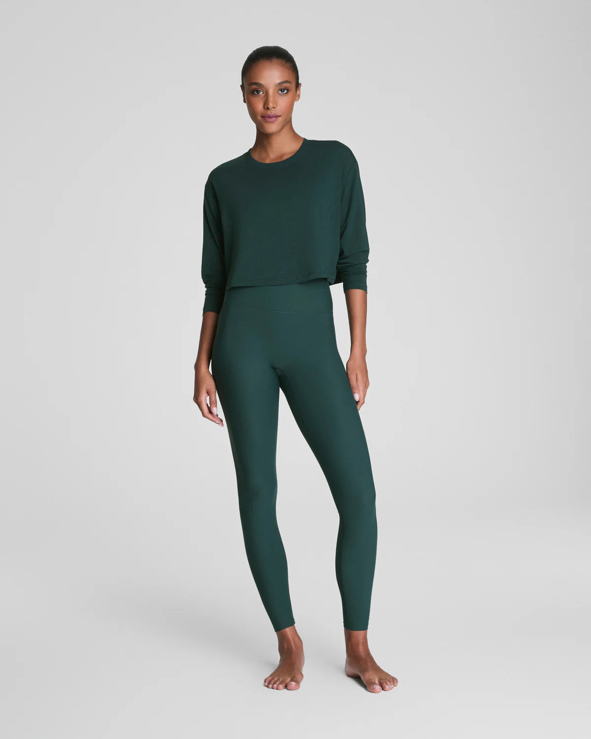 SPANX Outpace Cropped Long Sleeve Top in Meridian at Baseline Social