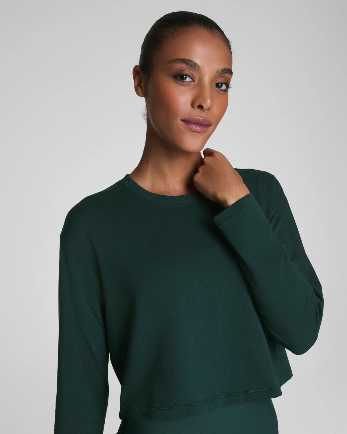 SPANX Outpace Cropped Long Sleeve Top in Meridian at Baseline Social