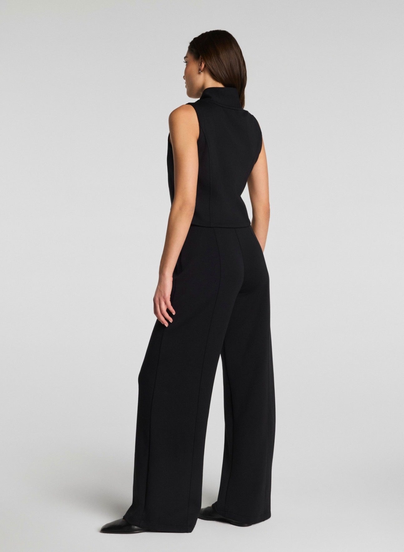 SPANX AirEssentials Shawl Collar Half Zip Jumpsuit in Very Black at Baseline Social