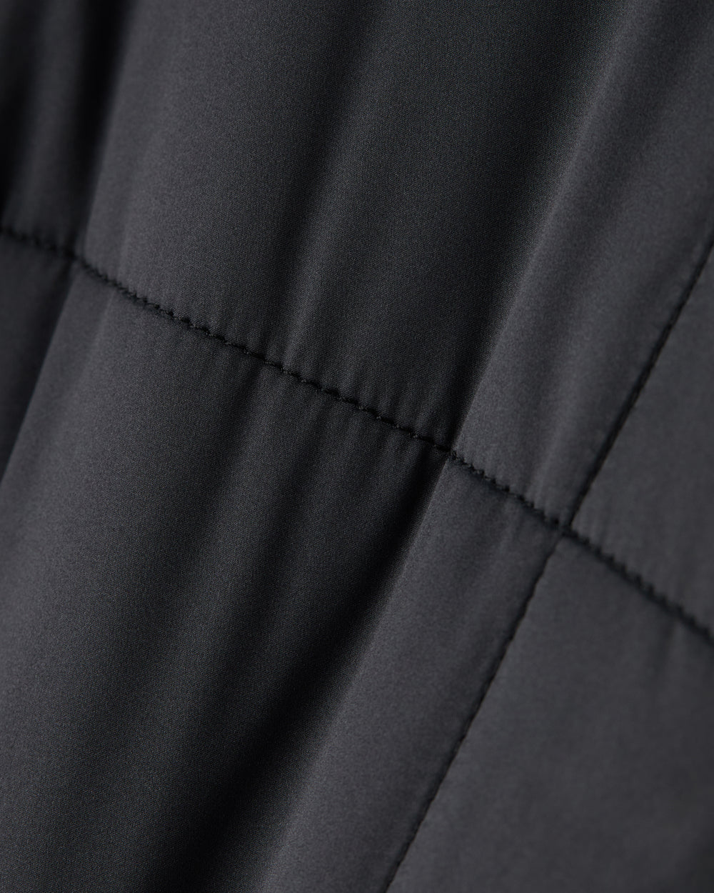 Rhone Chalet Quilted Jacket in Pure Black at Baseline Social