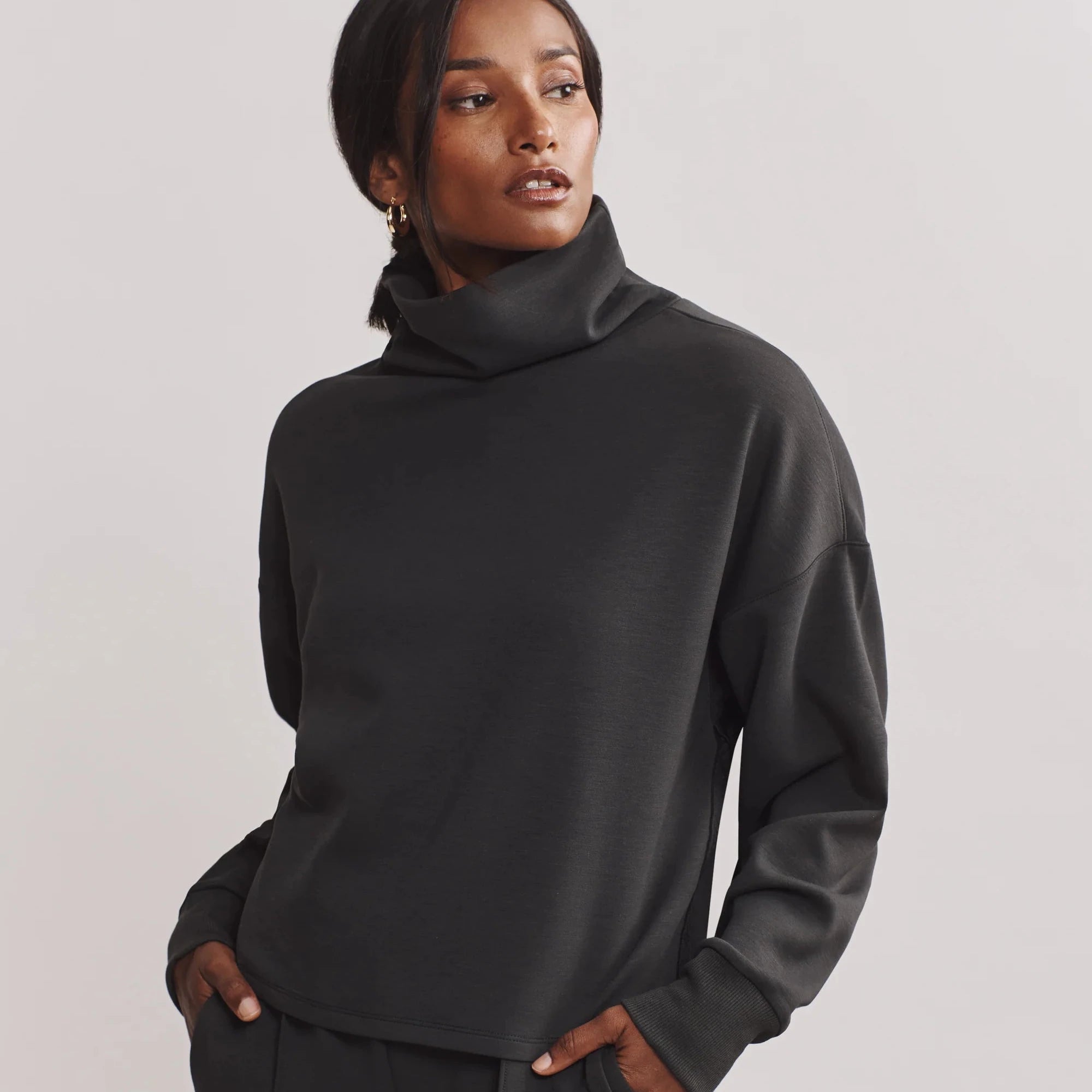 Rhone DreamGlow Mock Neck Sweatshirt in Black