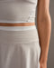 Rhone DoubleTake Skort in Sand at Baseline Social