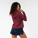 Rhoback Tempo Performance Hoodie in Red Card Red/Merlot Heather at Baseline Social