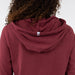 Rhoback Tempo Performance Hoodie in Red Card Red/Merlot Heather at Baseline Social