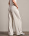 Rhone Horizon Trouser in Sand at Baseline Social