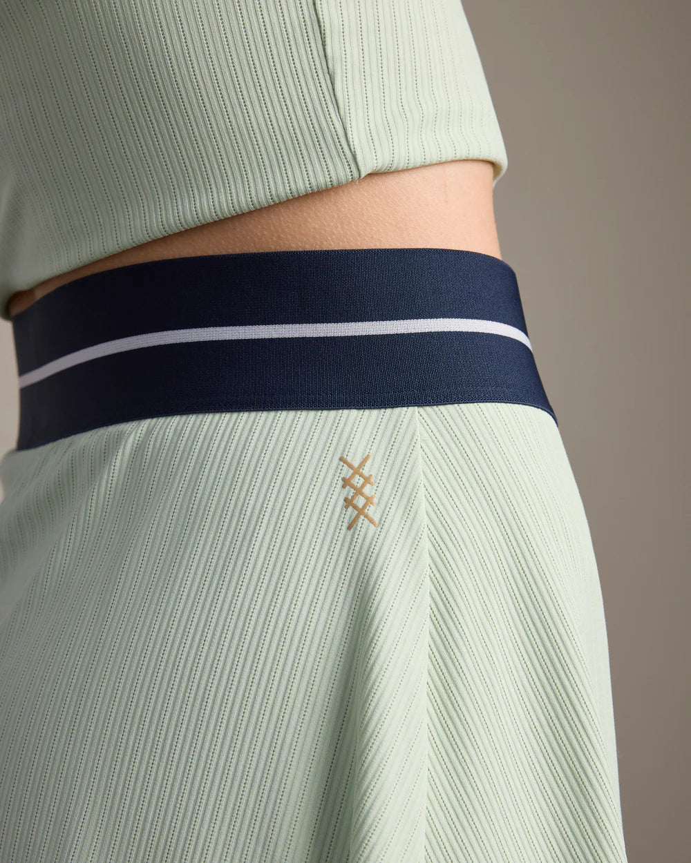 Rhone LightSpeed Court Skort in Cool Mint at Baseline Social