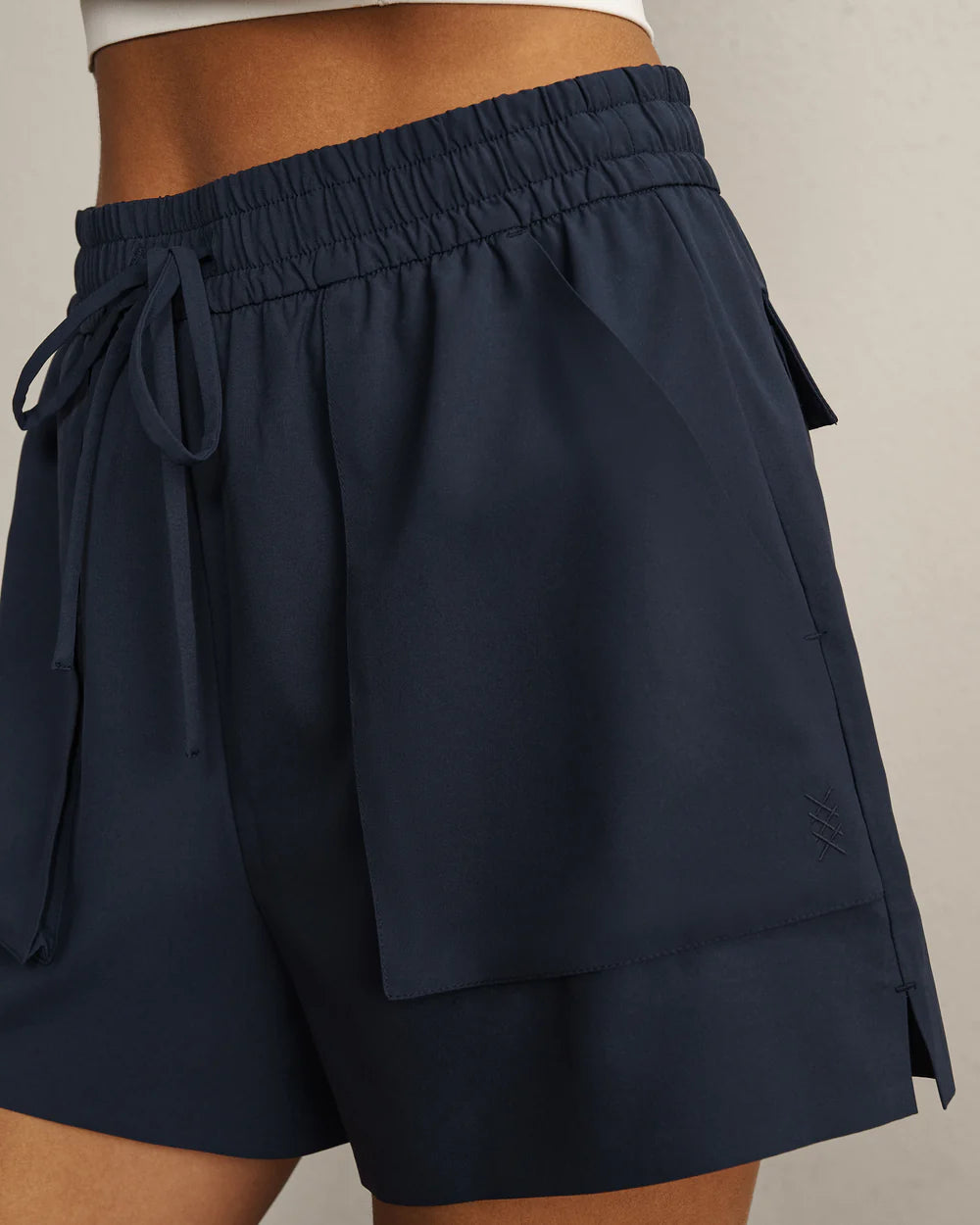 Rhone Mirage Pocket Short in Navy Blue at Baseline Social