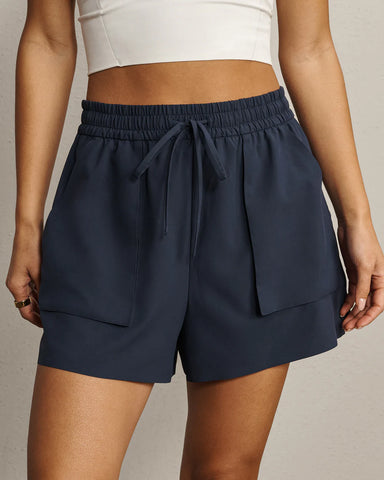 Rhone Mirage Pocket Short in Navy Blue at Baseline Social