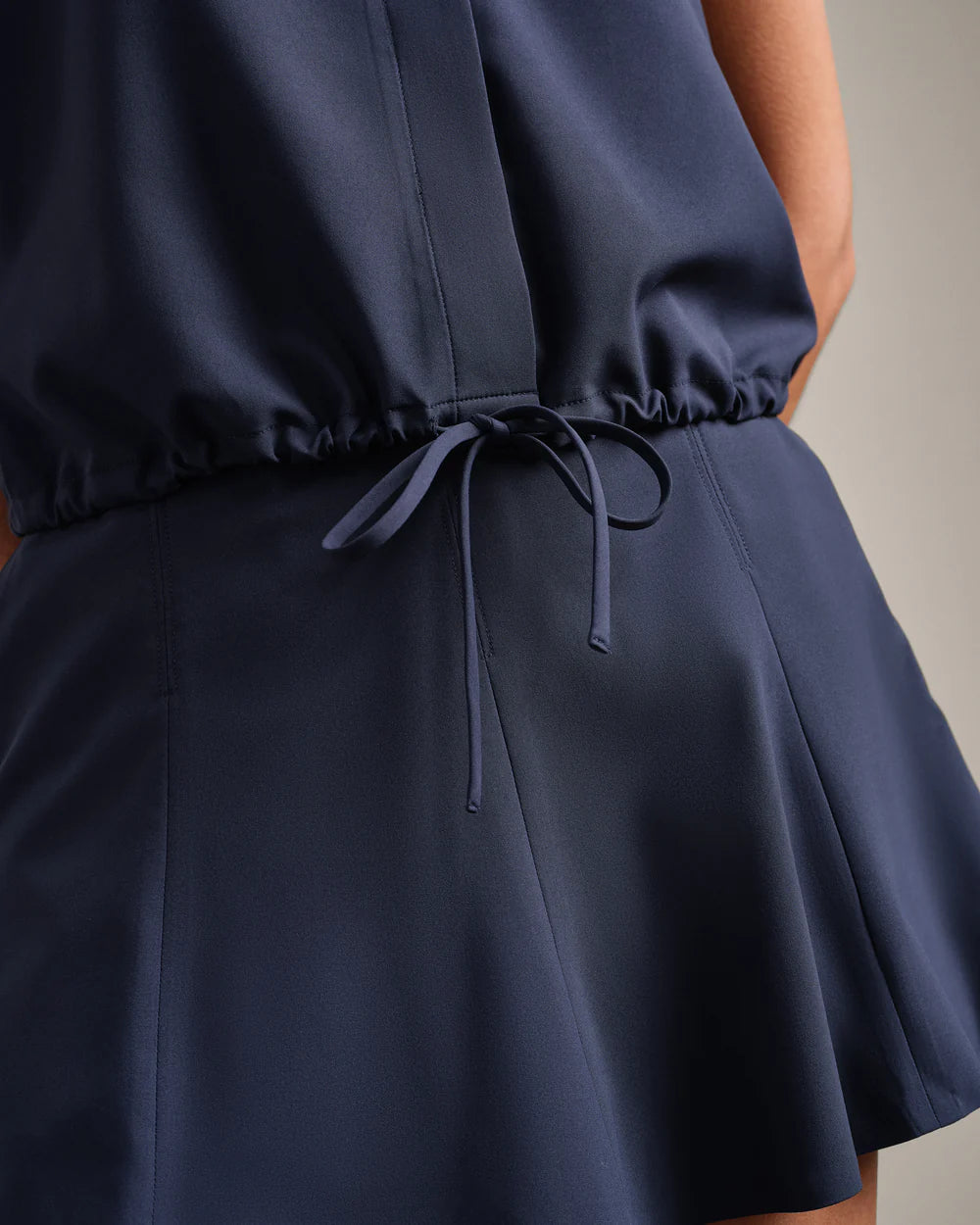Rhone Mirage Sleeveless Notch Collar Blouse in Navy Blue at Baseline Social