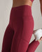 Rhone Revive 7/8 Pocket Legging in Cranberry at Baseline Social