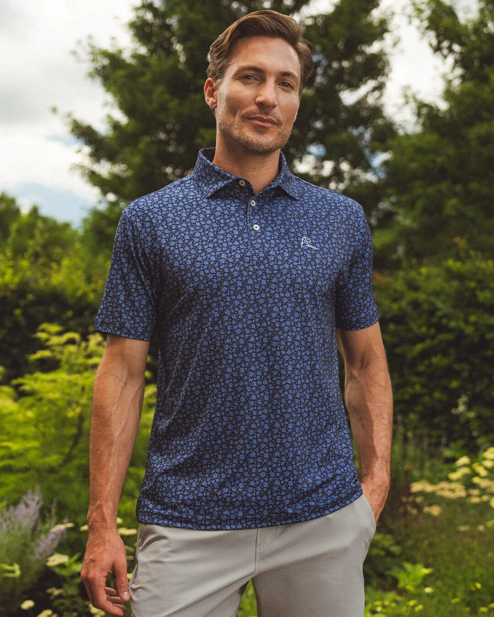 The Camellia Performance Polo in Fleet Navy