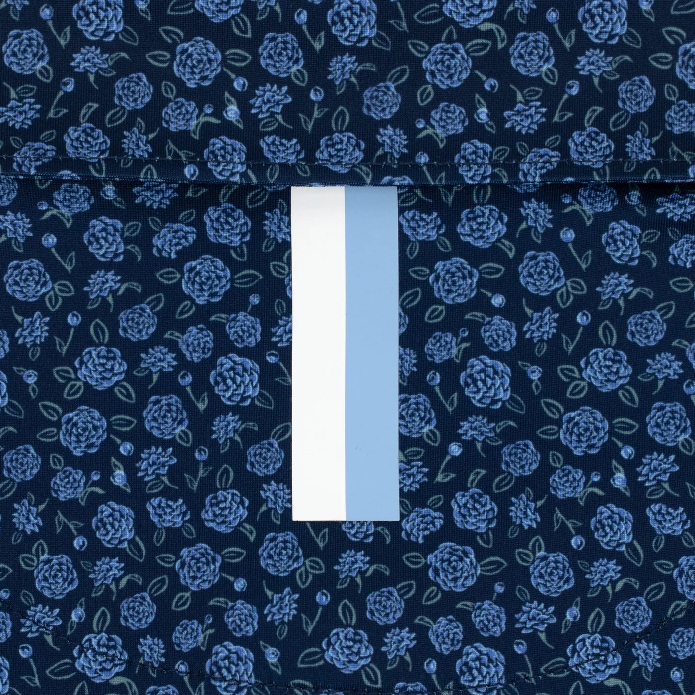 The Camellia Performance Polo in Fleet Navy