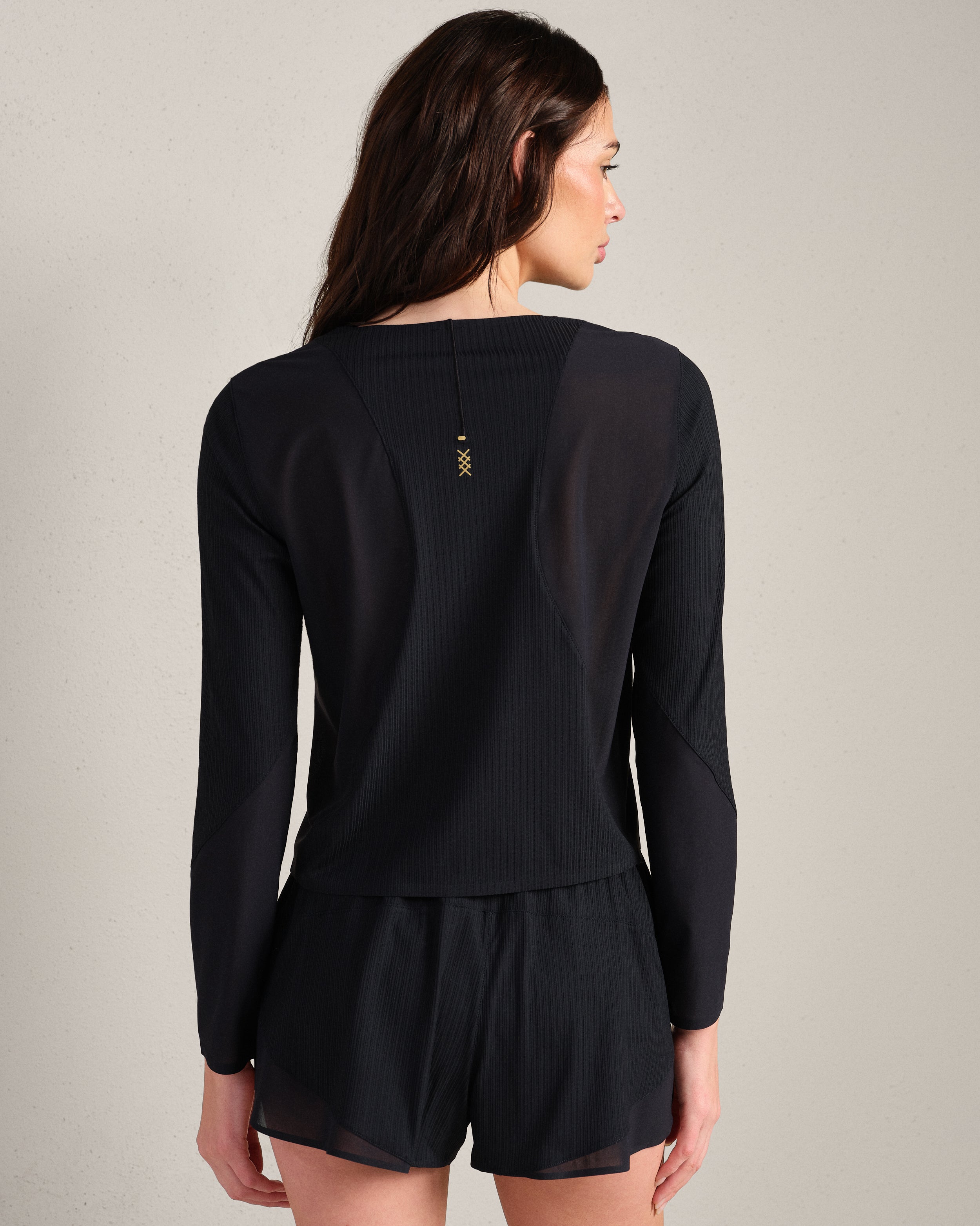 Rhone Lightspeed Long Sleeve in Pure Black at Baseline Social