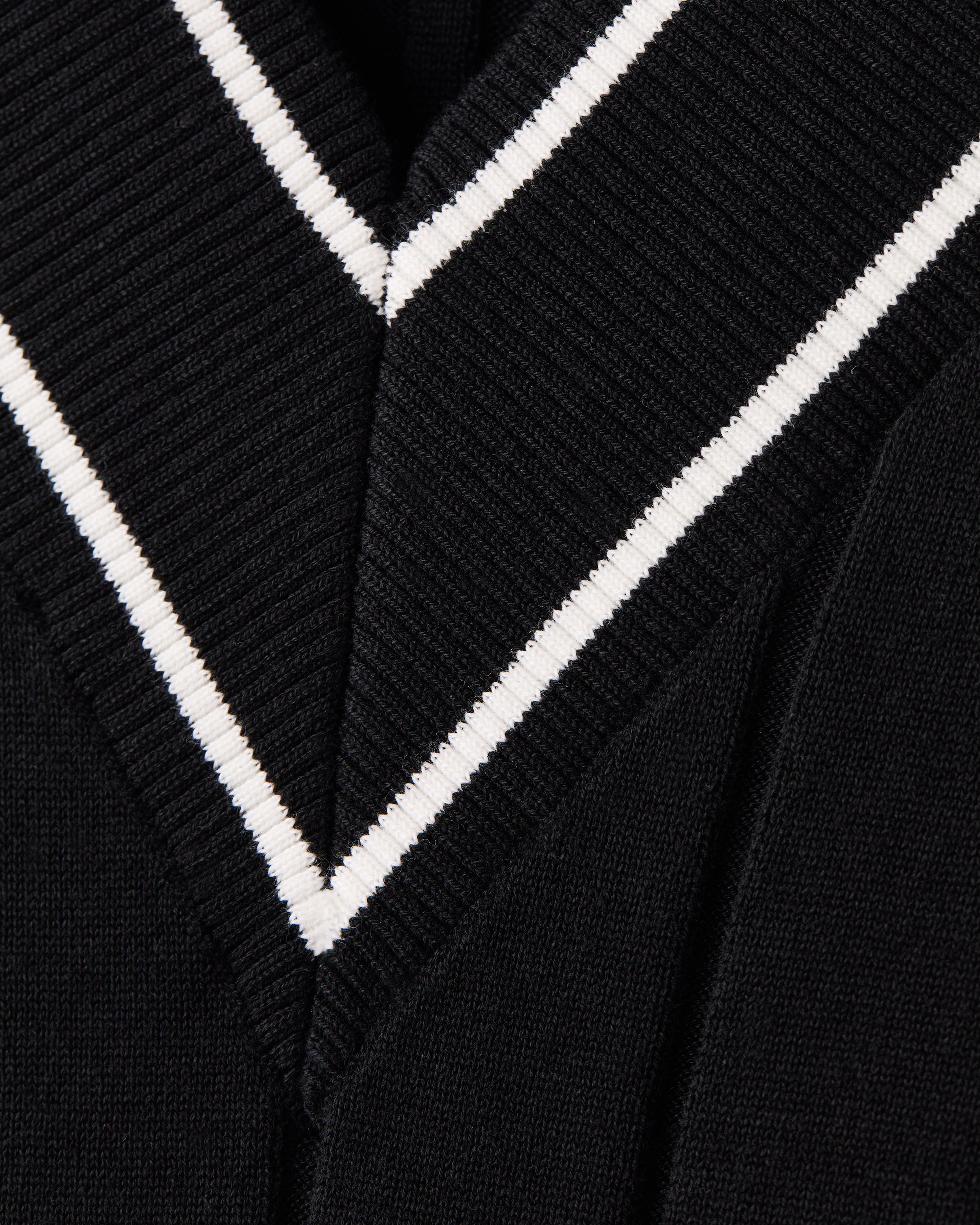 Rhone Varsity Cable Knit Sweater in Pure Black at Baseline Social