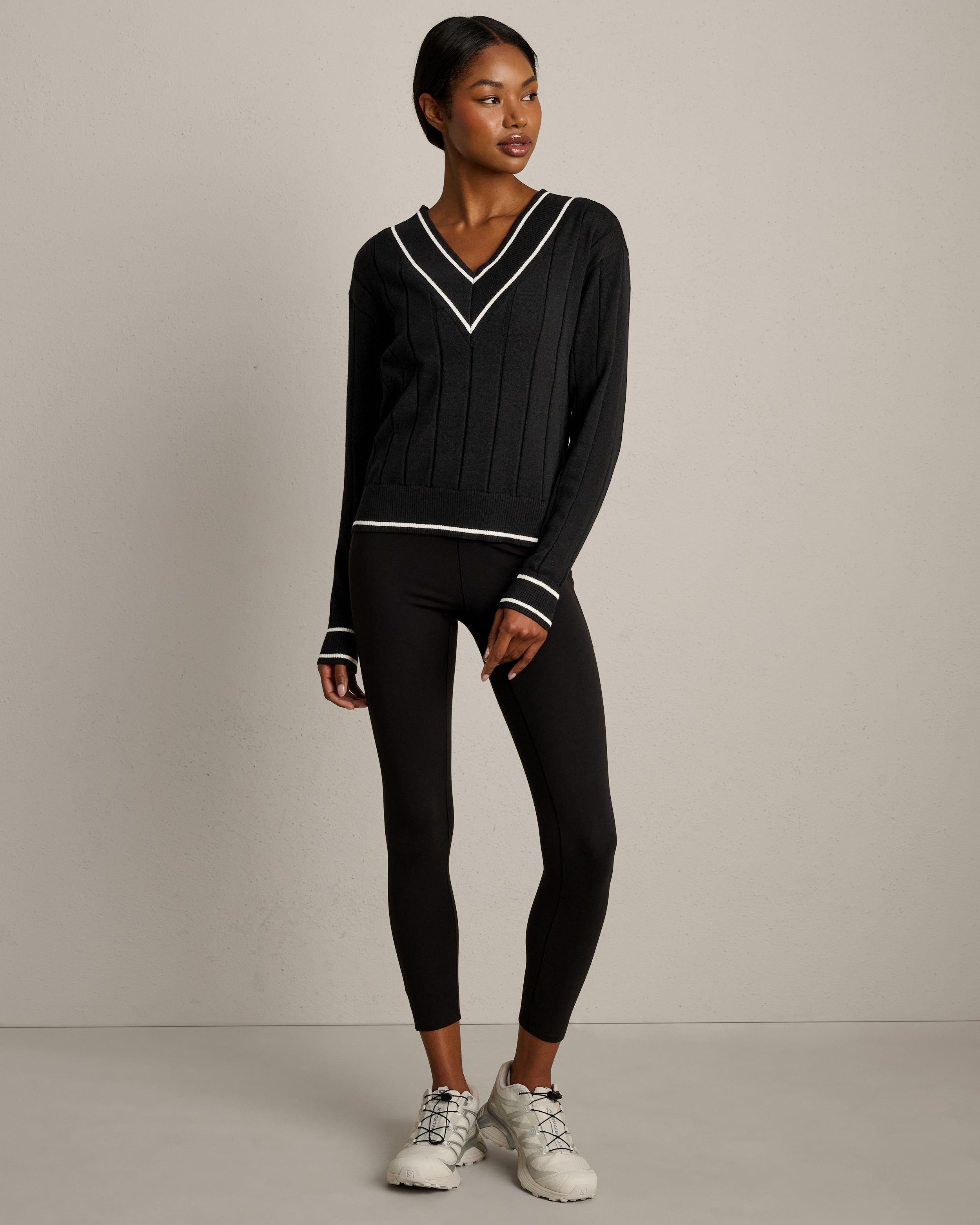 Rhone Varsity Cable Knit Sweater in Pure Black at Baseline Social
