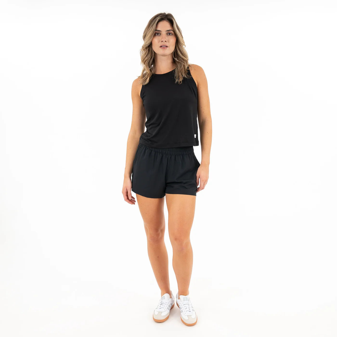 Rhoback Drift Performance Crop Tank in Midnight Black at Baseline Social