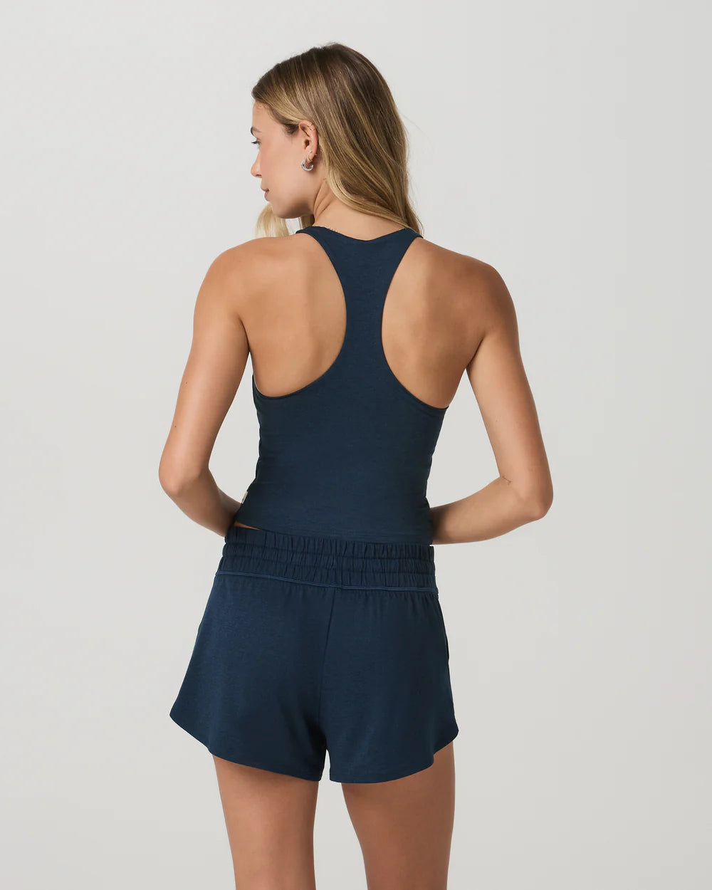 Vuori Halo Performance Crop 2.0 in Blue Coast Heather at Baseline Social