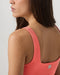 Vuori AllTheForm Tank in Bright Coral at Baseline Social
