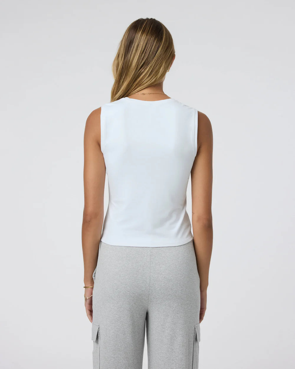 Vuori Halo Essential Scoop Tank in White at Baseline Social