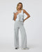 Vuori Halo Essential Scoop Tank in White at Baseline Social