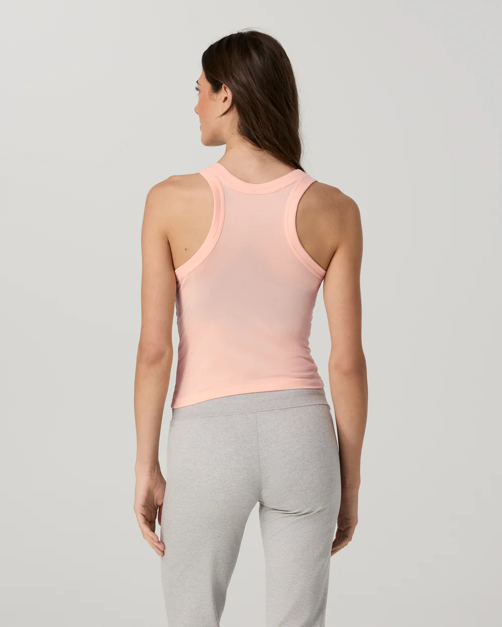 Vuori Energy Racerback Tank in Light Peach at Baseline Social