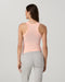 Vuori Energy Racerback Tank in Light Peach at Baseline Social