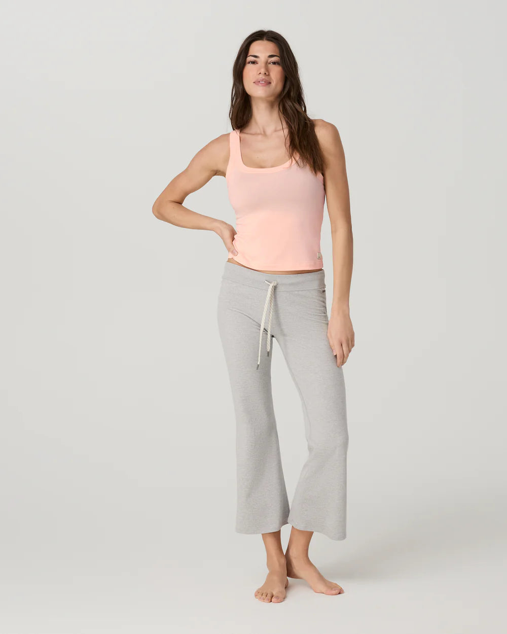 Vuori Energy Racerback Tank in Light Peach at Baseline Social