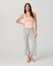 Vuori Energy Racerback Tank in Light Peach at Baseline Social