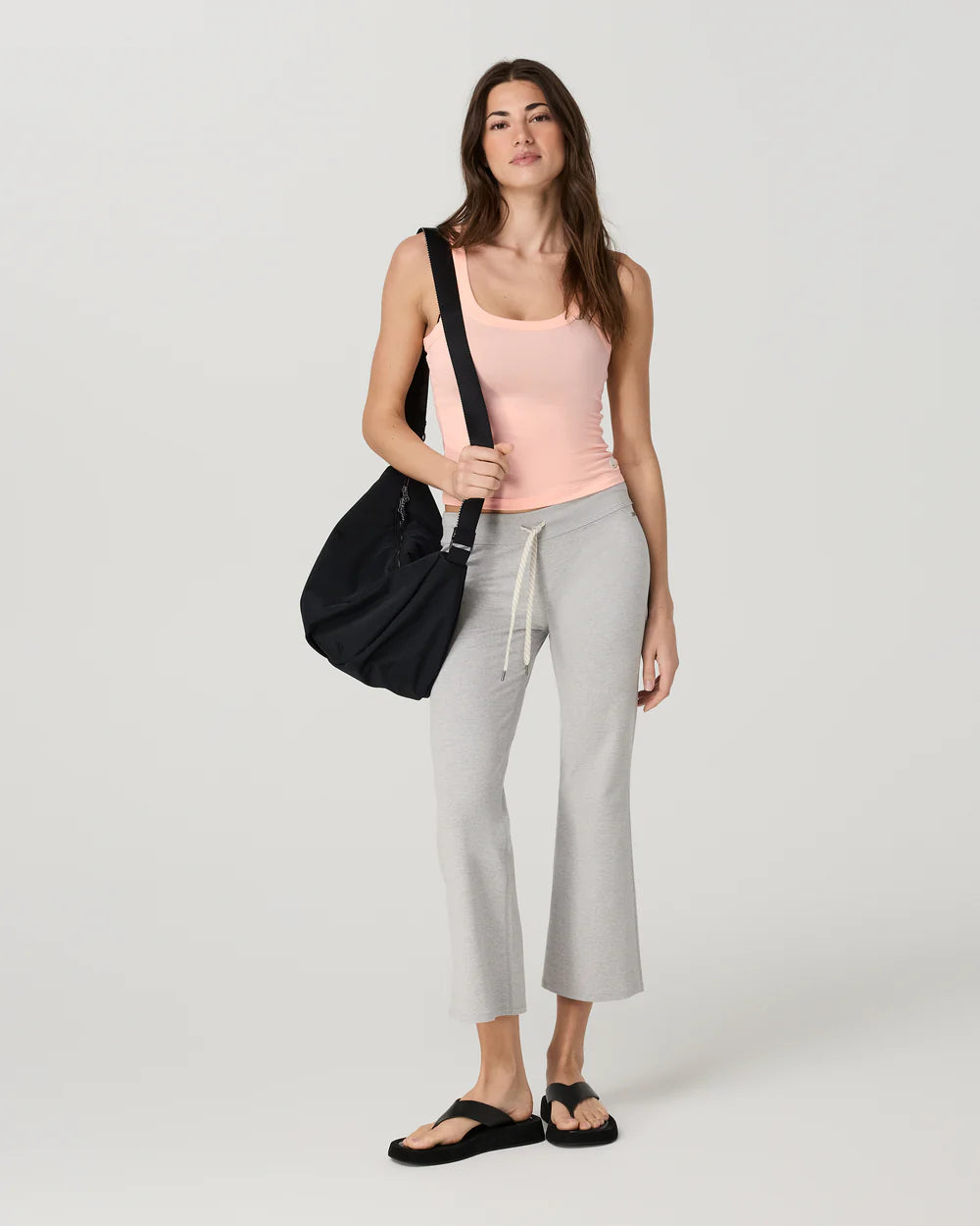 Vuori Energy Racerback Tank in Light Peach at Baseline Social
