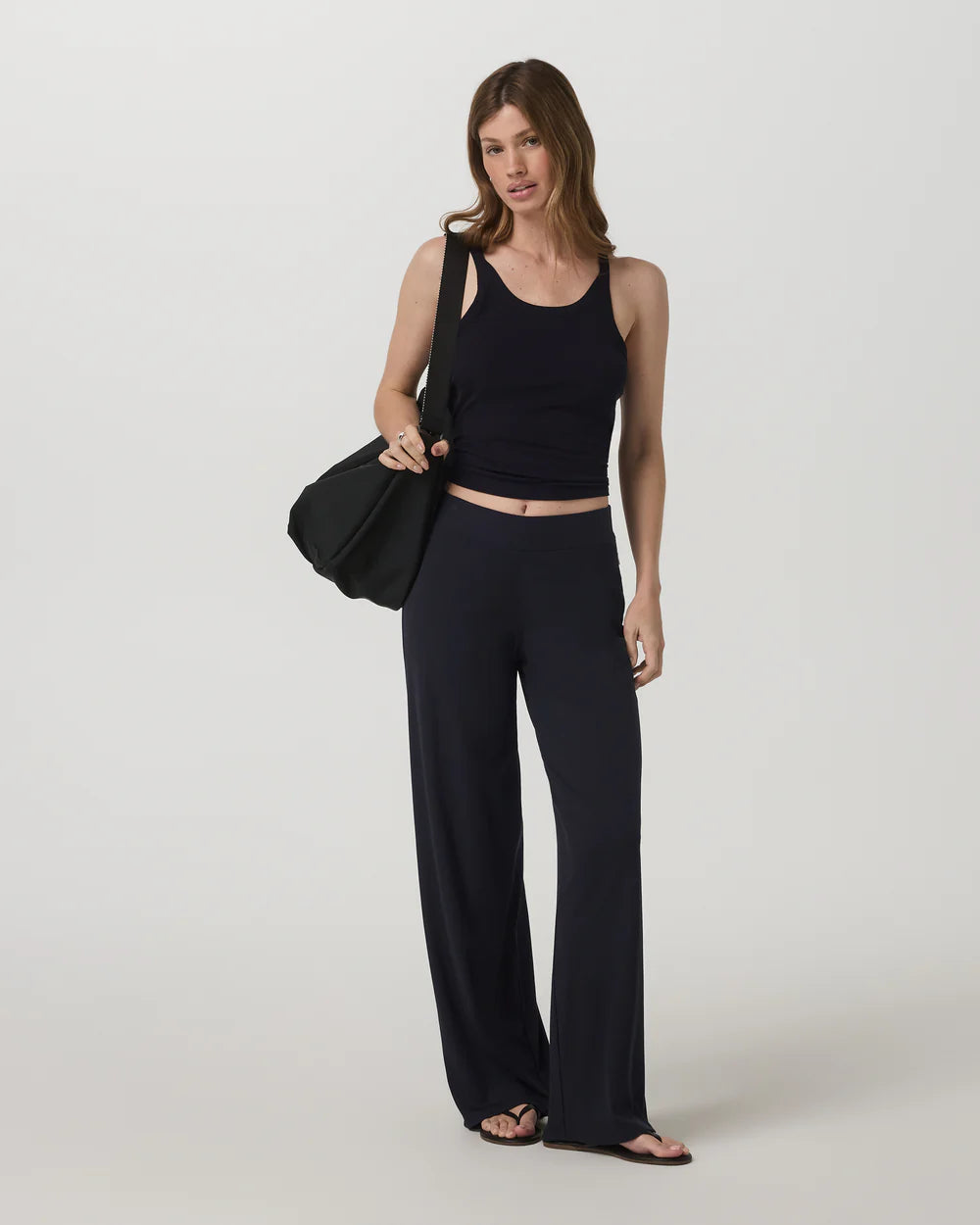 Vuori Pose Wideleg Pant in Black at Baseline Social