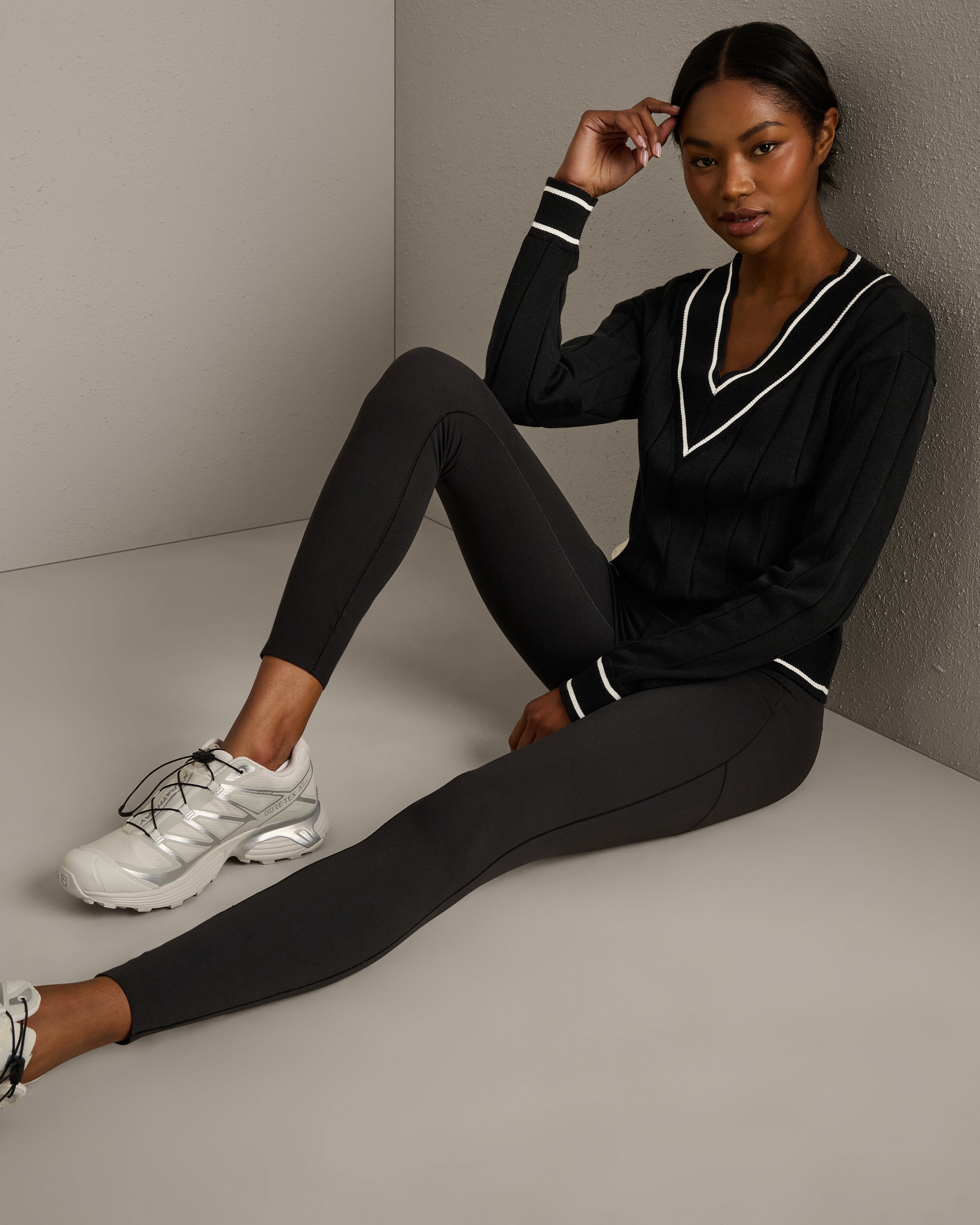 Rhone Varsity Cable Knit Sweater in Pure Black at Baseline Social