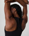 Vuori Surge Seamless Tank in Black at Baseline Social