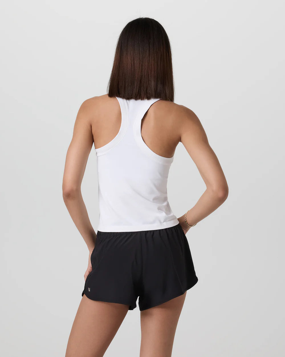 Vuori Surge Seamless Tank in White at Baseline Social