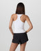Vuori Surge Seamless Tank in White at Baseline Social