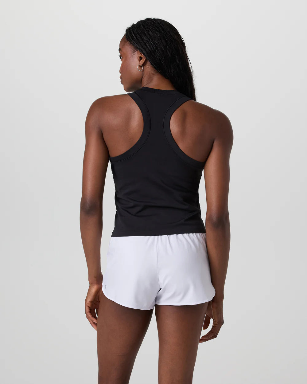 Vuori Surge Seamless Tank in Black at Baseline Social