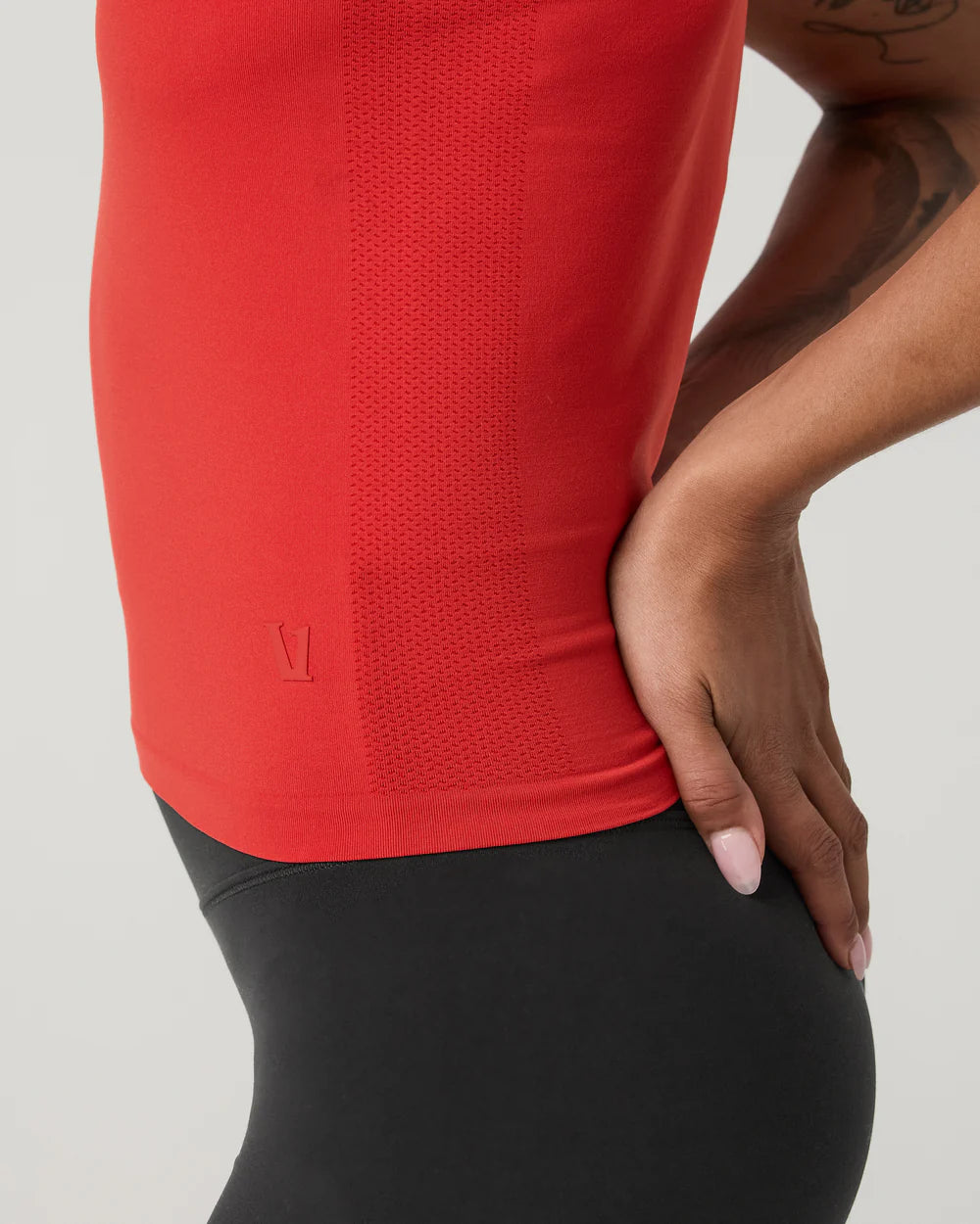 Vuori Surge Seamless Tank in Crimson Red at Baseline Social