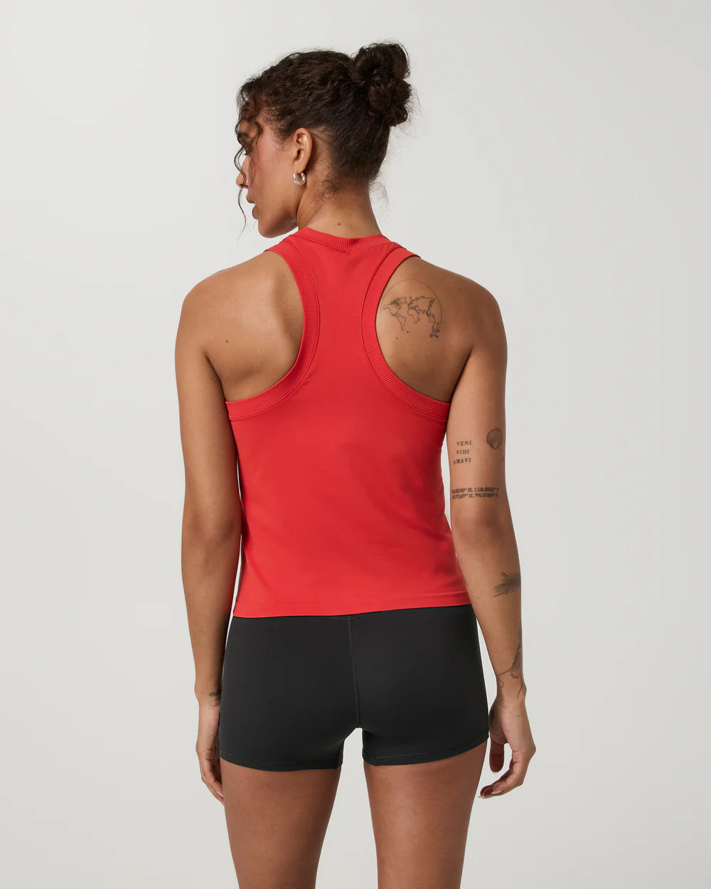 Vuori Surge Seamless Tank in Crimson Red at Baseline Social