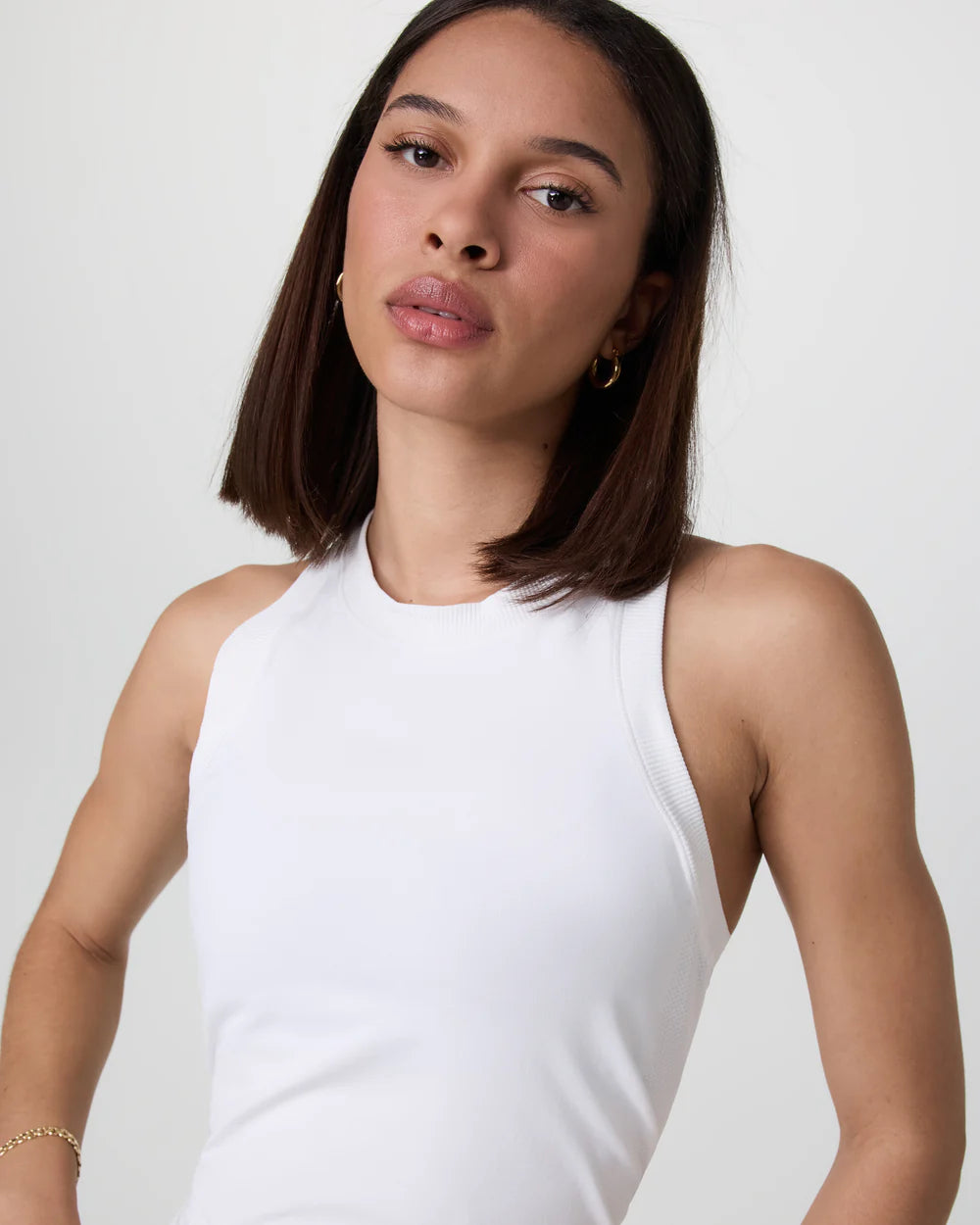 Vuori Surge Seamless Tank in White at Baseline Social
