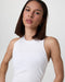 Vuori Surge Seamless Tank in White at Baseline Social