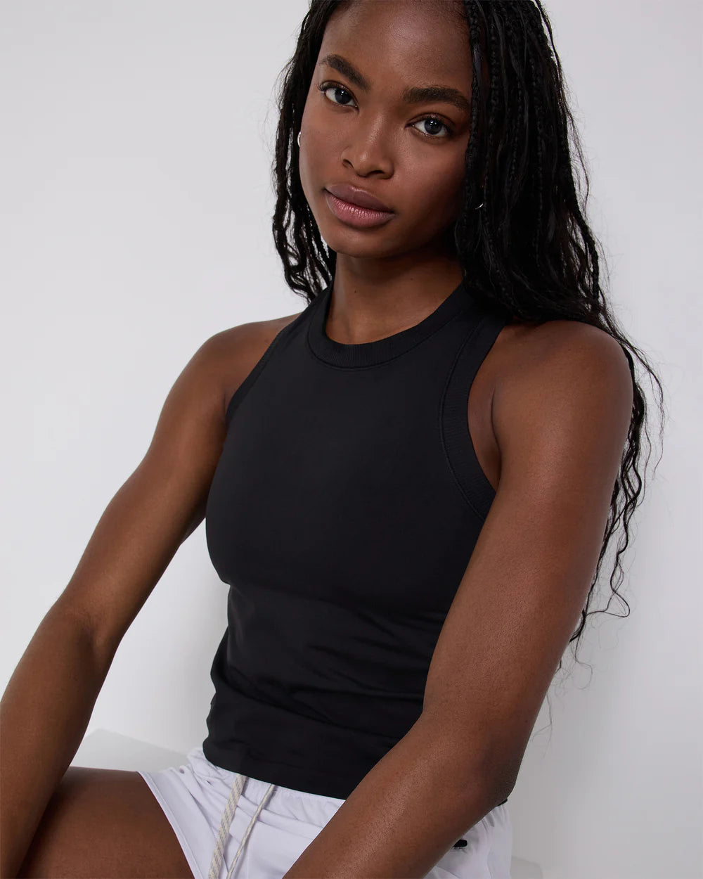 Vuori Surge Seamless Tank in Black at Baseline Social